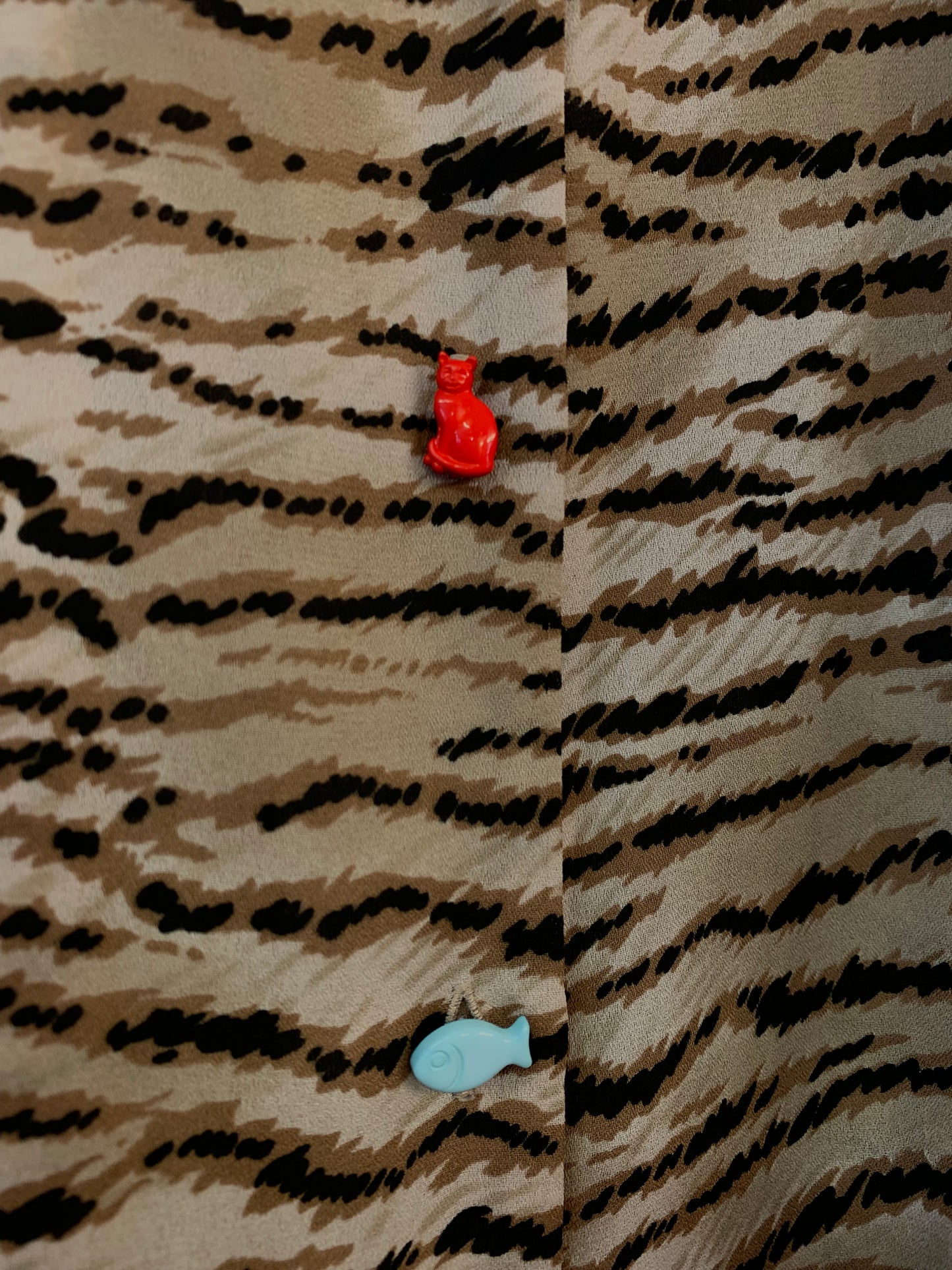 Animal print long sleeved top with novelty buttons size M (16)