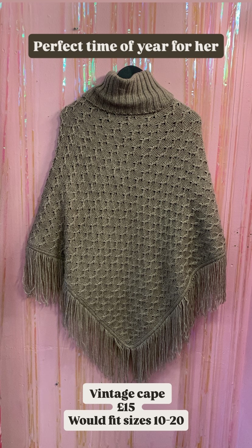 Beautiful grey turtleneck knit cape