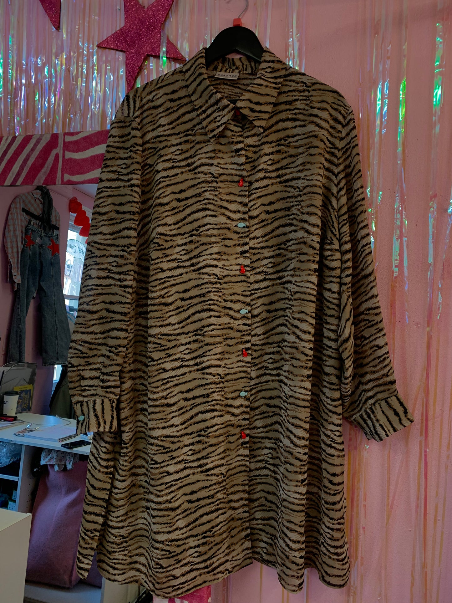 Animal print long sleeved top with novelty buttons size M (16)