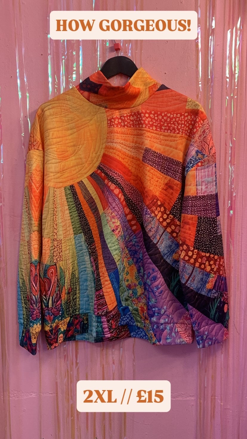 Quilted Effect Turtleneck Blouse